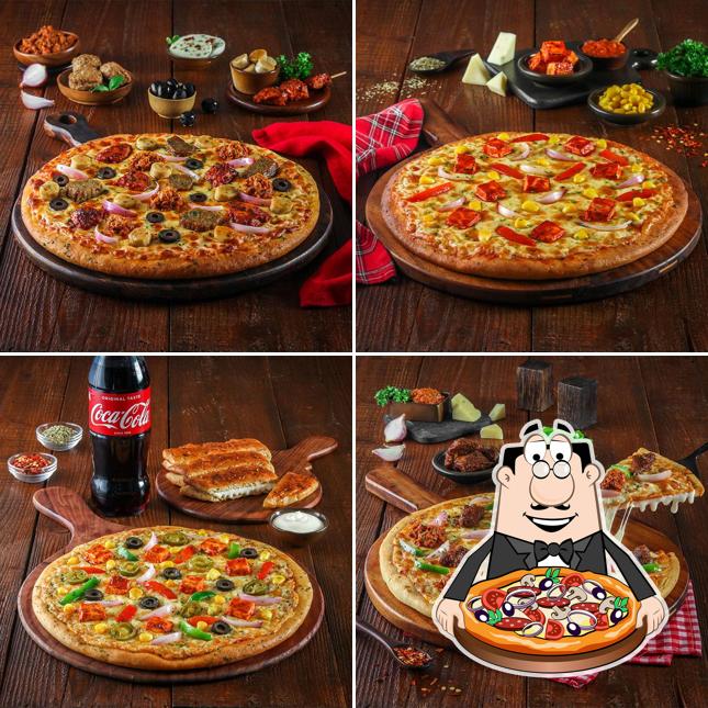 Try out pizza at Oven Story