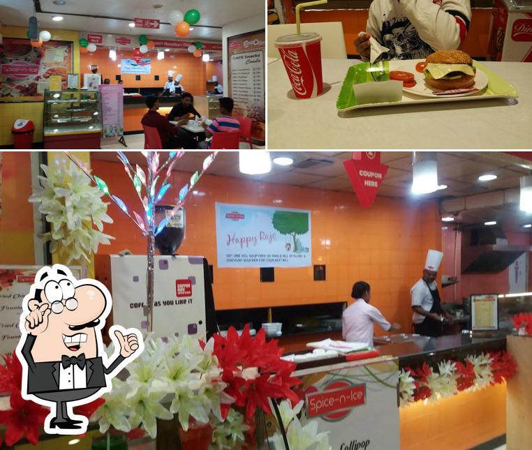 This is the picture displaying interior and burger at Spice-n-Ice