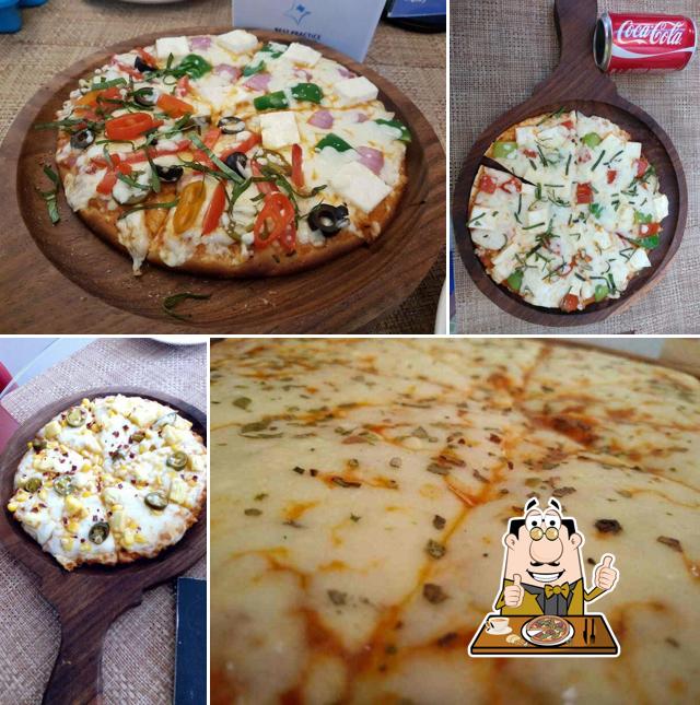 Order pizza at Cafe Thancos