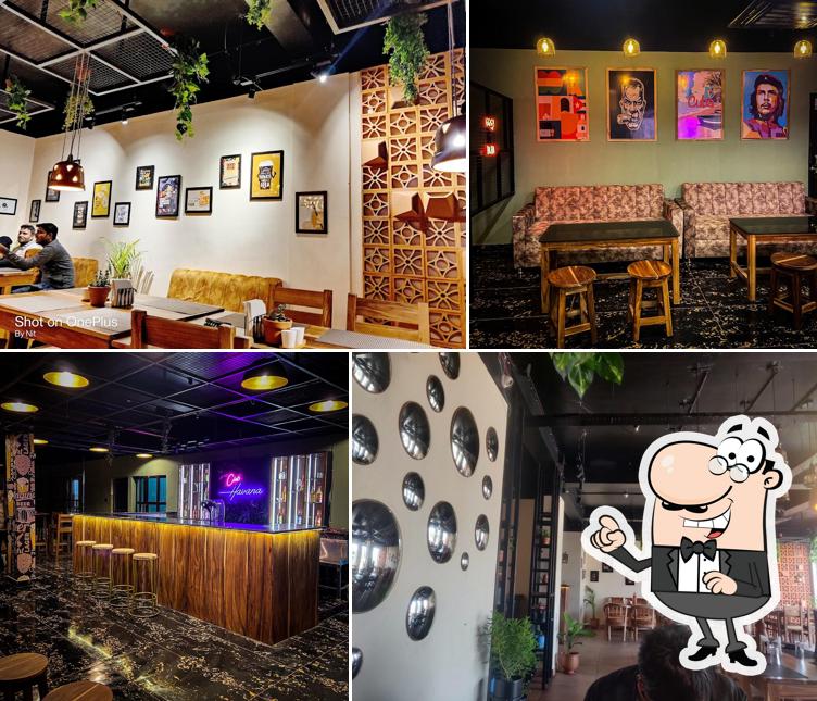 Take a seat at one of the tables at Tapioca Multi Cuisine Restaurant