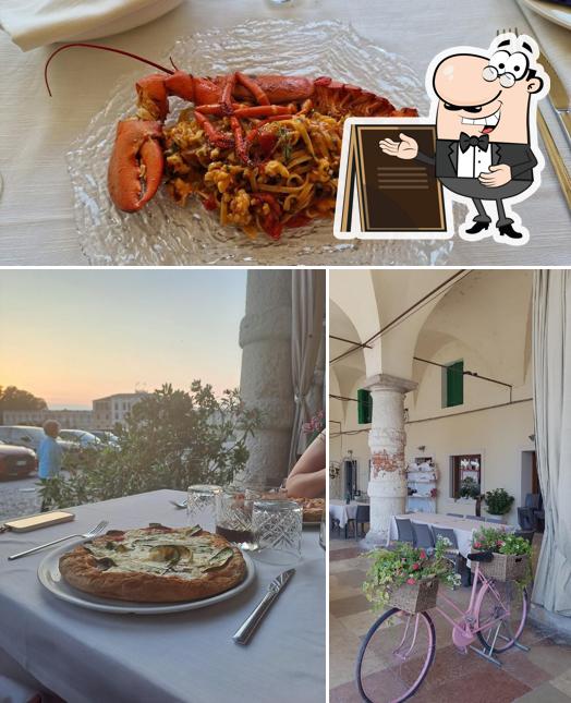 Dai un’occhiata alla foto che presenta la esterno e cibo di Ai Portici