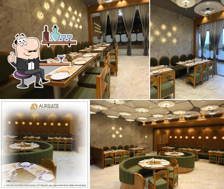 Take a seat at one of the tables at Aureate Restaurant & Banquet