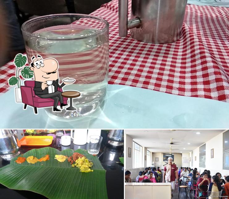 This is the photo depicting interior and food at Tharavadu The multi Cuisine Restaurant