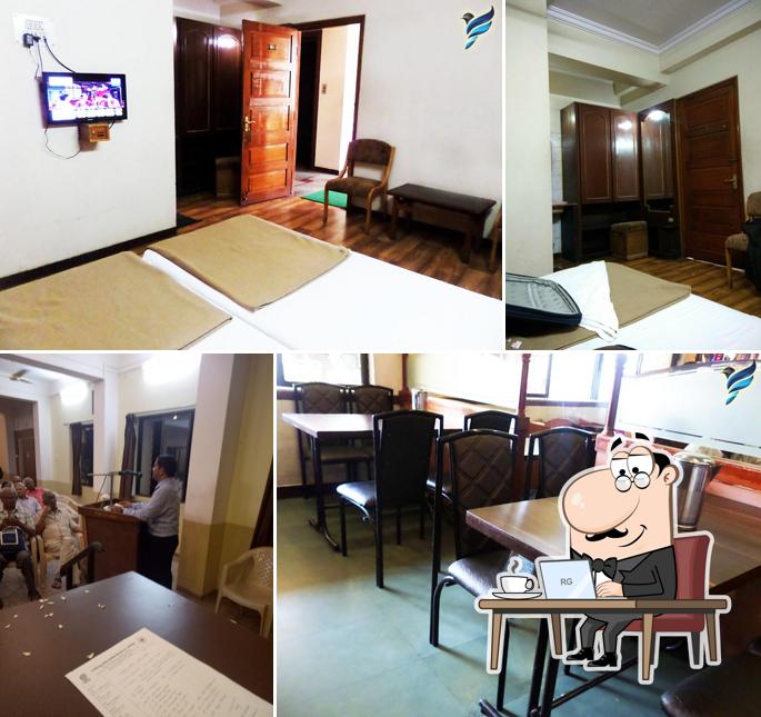 Take a seat at one of the tables at Hotel Maharaja Deluxe