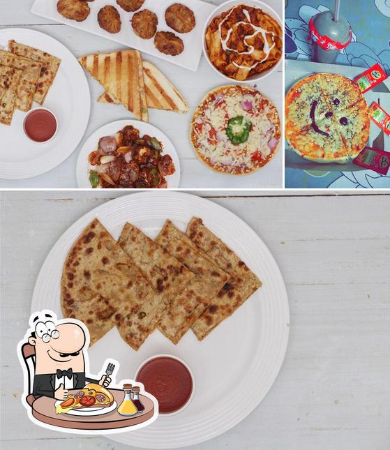 Get pizza at Satvik's Cafe House