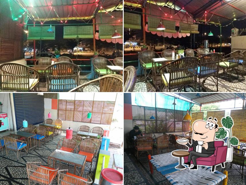 Take a seat at one of the tables at Hangout Cafe