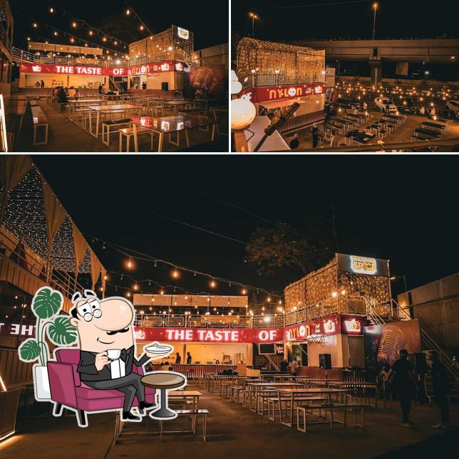 The image of interior and exterior at Warming Spice Restro-Café