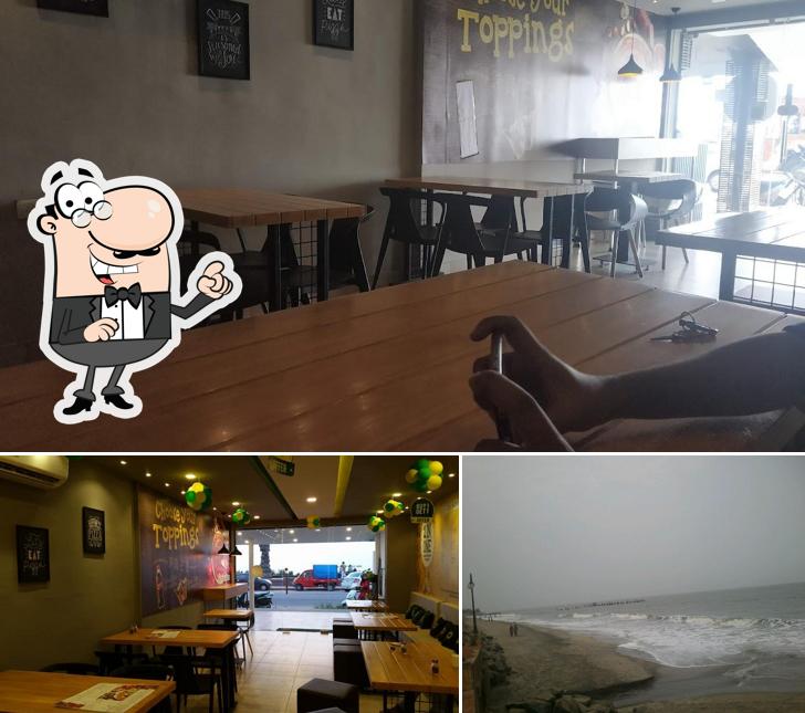 Among different things one can find interior and exterior at PIZZA RICOTTA Beach - Best Pizza in Calicut