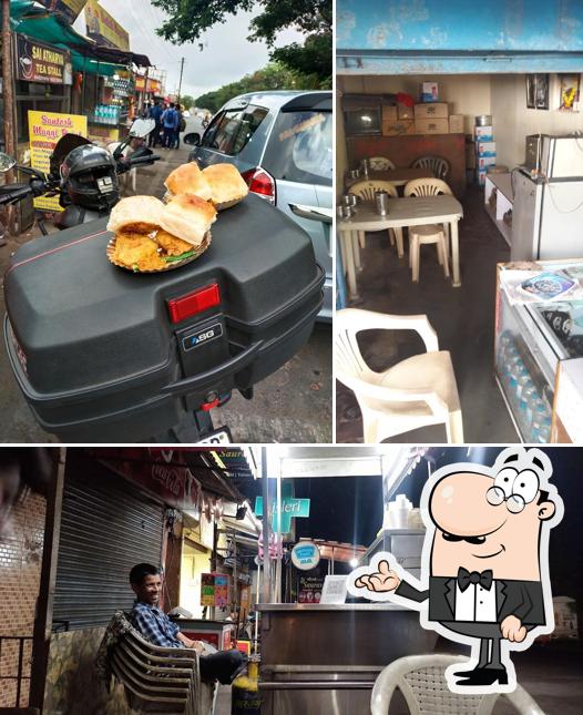 Take a look at the picture displaying interior and exterior at Maggie points Akku's fast food