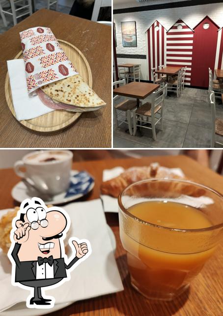 Questa è la foto che presenta la interni e cibo di Casa Maioli