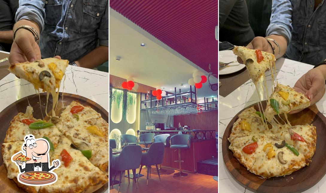 Pick pizza at Three Guys Cafe And Lounge