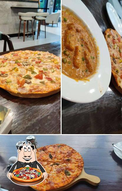 Try out pizza at Cafe Chapter One
