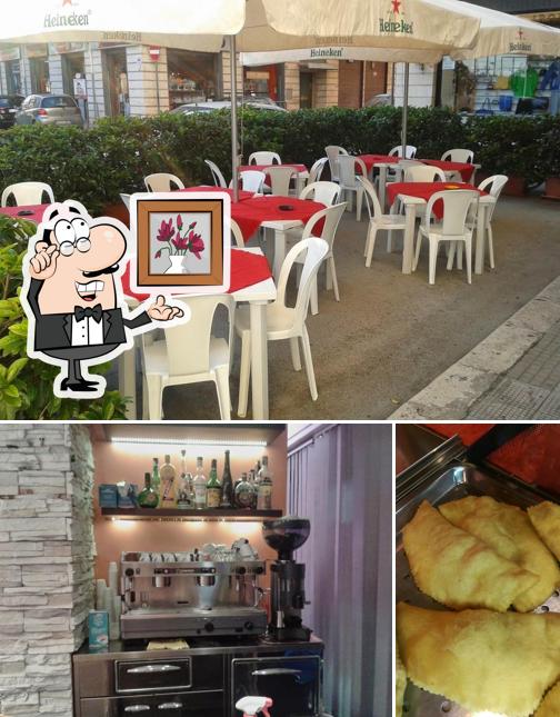 La immagine della interni e cibo di BAR PIZZERIA EUROPA