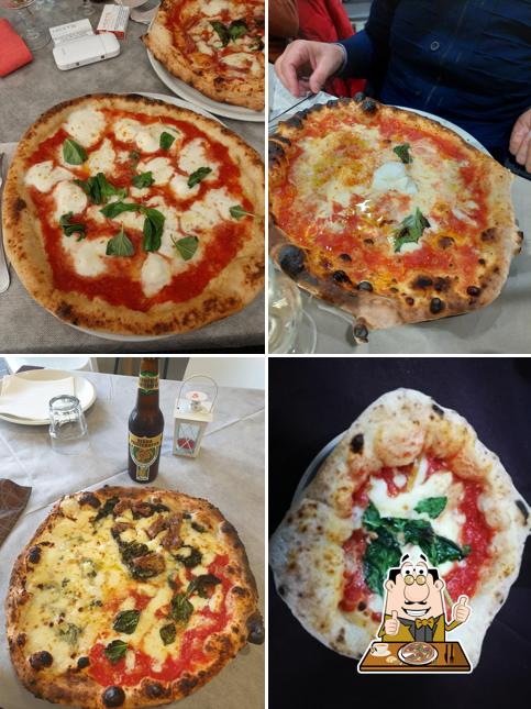 A Carpe Diem Pizzeria Ristorante, puoi prenderti una bella pizza
