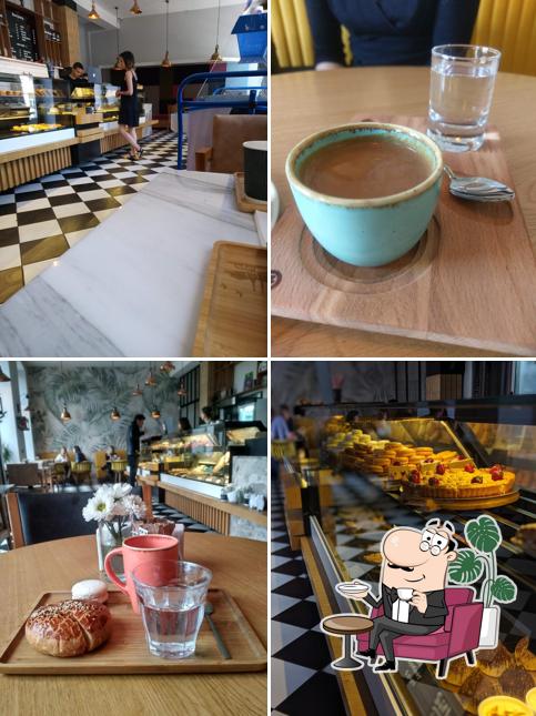 Installez-vous à l'une des tables de Kartoplyana Khata