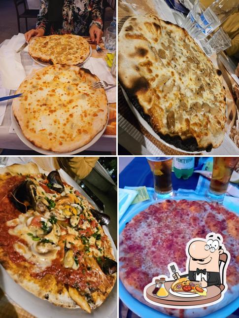 Prova una pizza a TORTUGA Ristorante Bar Pizzeria