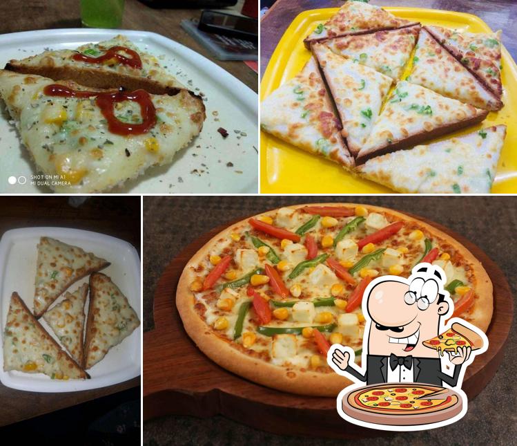 Order pizza at Shiva's Coffee Bar ( C.G Road )