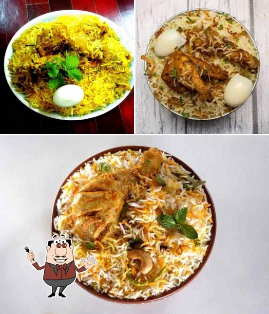 Take a look at the photo depicting food and interior at Arbic Biriyani