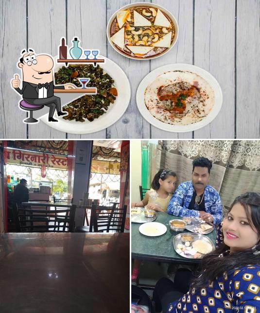 This is the image depicting interior and food at Girinar Restaurant