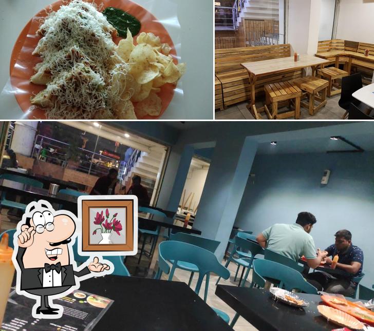 The photo of interior and food at Sainath Sandwich