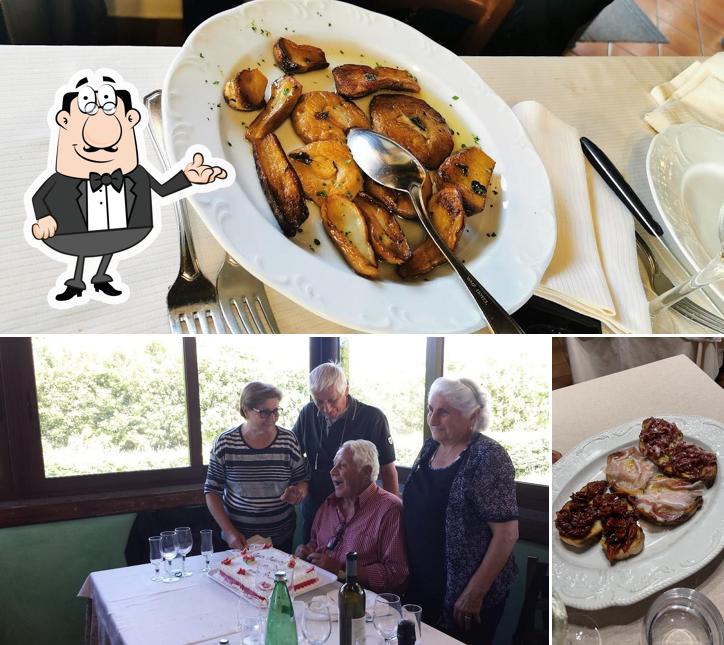 La immagine di interni e tavolo da pranzo da La Locanda Dell Orso Rosa