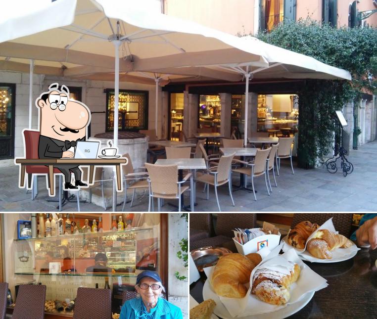 Questa è la foto che mostra la interni e cibo di Caffè Brasilia