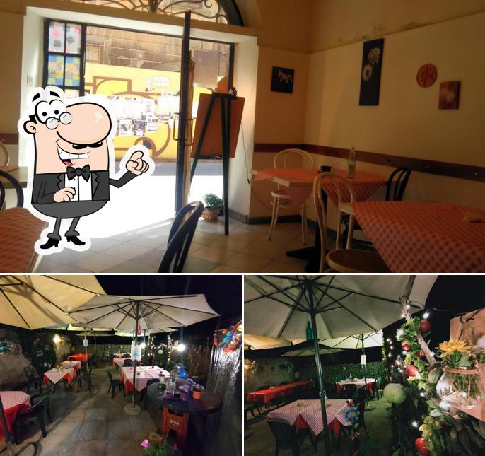 Siediti a un tavolo di Pizzeria Moonlight