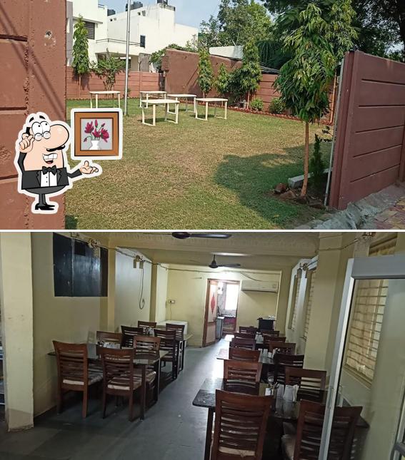 The interior of New Krishna kaveri Restaurant