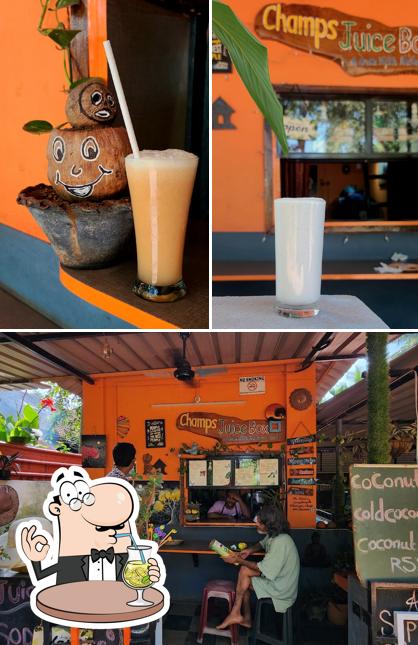 This is the picture displaying drink and interior at Champs Juice Box