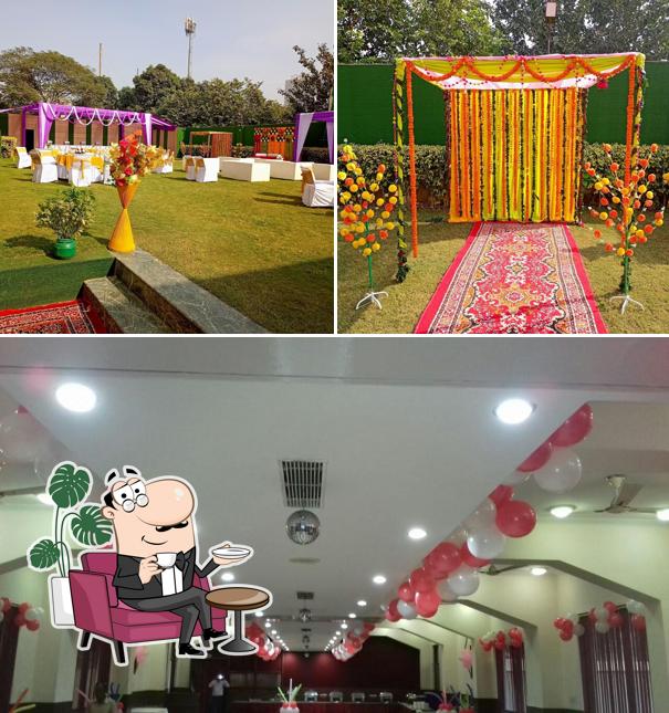 Take a seat at one of the tables at Hotel Maiden Residency