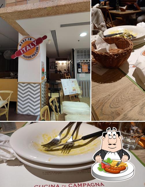 Questa è la foto che presenta la cibo e interni di Made in Italy