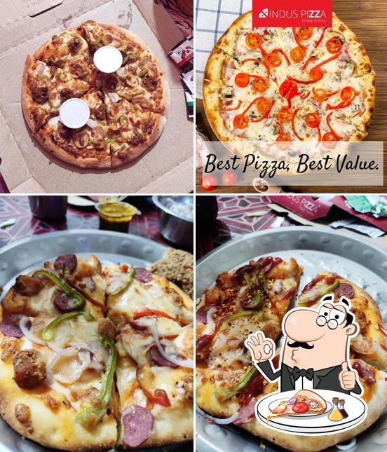At INDUS PIZZA, you can taste pizza