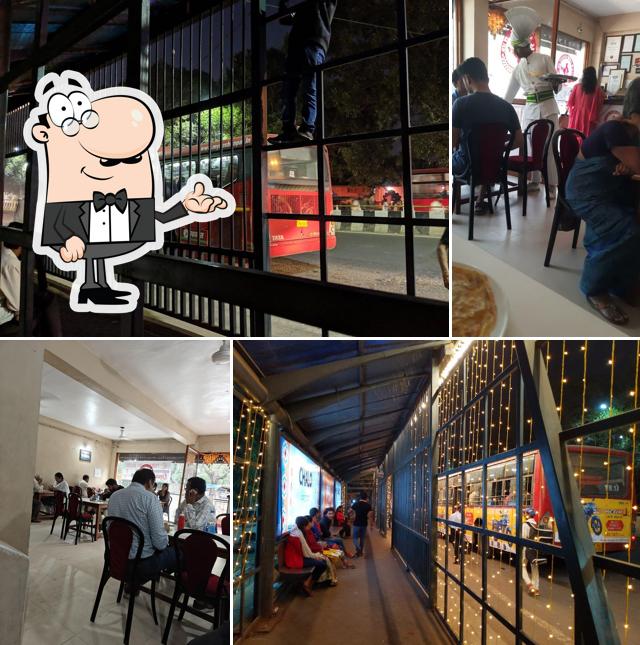 Take a seat at one of the tables at Indian Coffee House