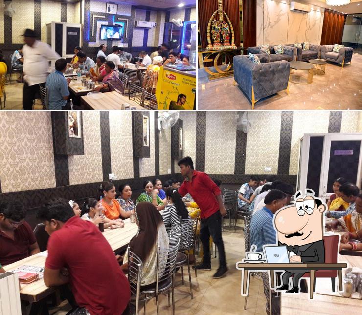 Take a seat at one of the tables at New Friends Dhaba