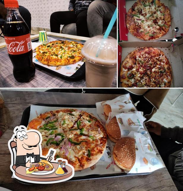 Pick pizza at Sip n Slice Farrukhnagar