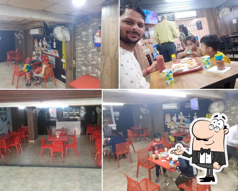 Take a seat at one of the tables at Rockers pizza