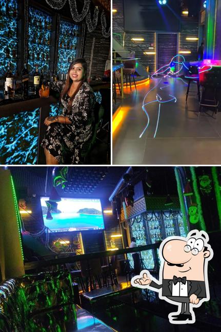 Take a seat at one of the tables at Maya - Lounge and Bar