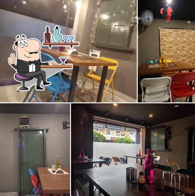 Take a seat at one of the tables at The Open Door