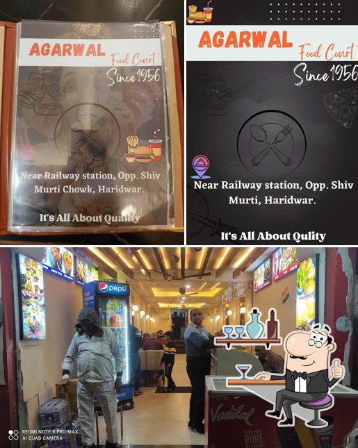 Take a seat at one of the tables at Agarwal food court