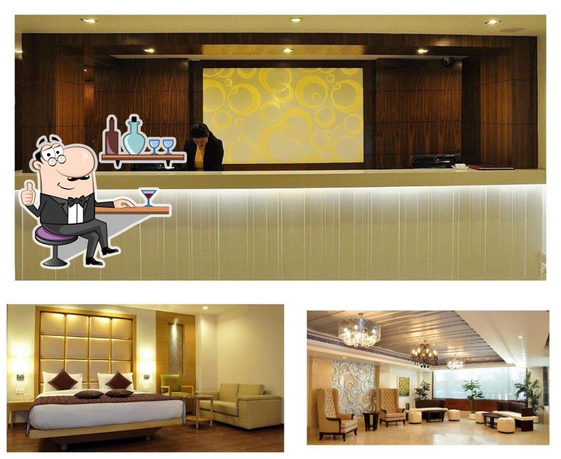 Take a seat at one of the tables at Almondz Hotel