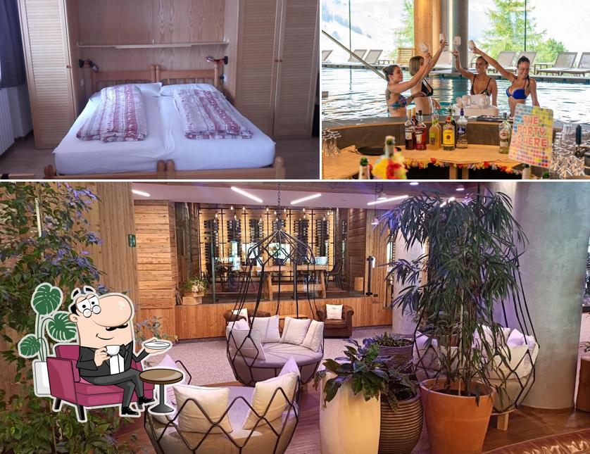 Siediti a un tavolo di Alpen Resort Bivio