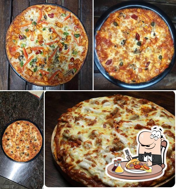 At PIZZA CRAVINGS (WOOD FIRED BRICK OVEN PIZZERIA), you can taste pizza