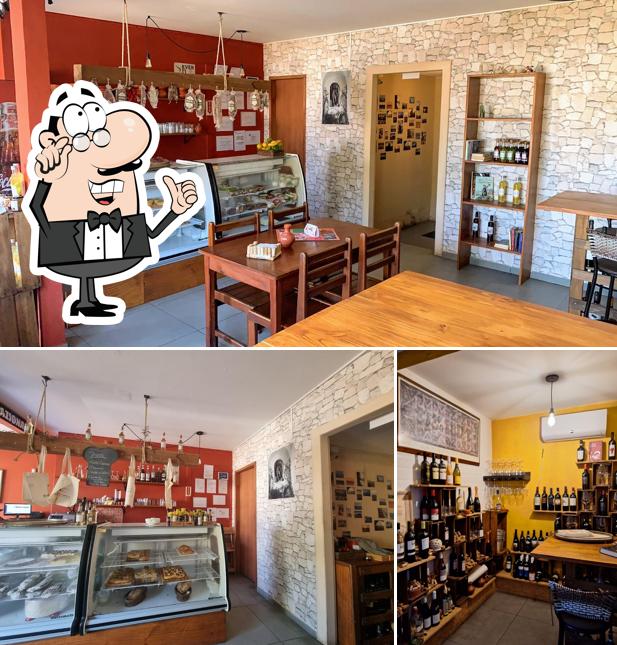 O interior do Salumeria San Michele Restaurante Emporium