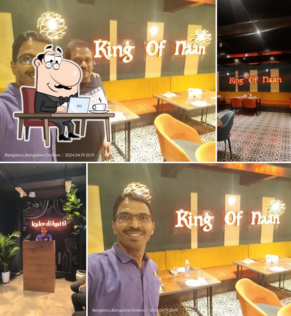 Take a seat at one of the tables at Kake Di Hatti Electronic City