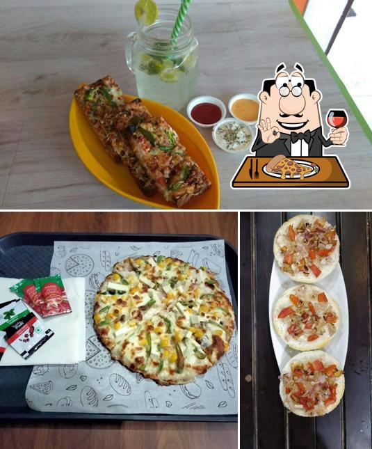 Get pizza at Shakes Adda