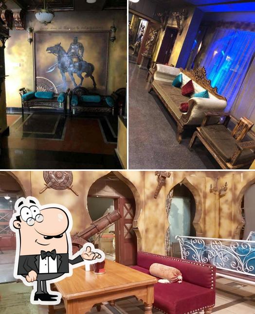 Take a seat at one of the tables at Chef Inam's Steak House n KOB