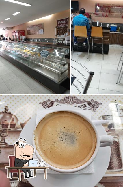 A imagem da interior e bebida no Danúbio Doces E Salgados