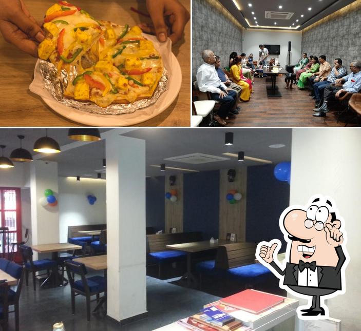 Take a seat at one of the tables at CFS The Red DOOR