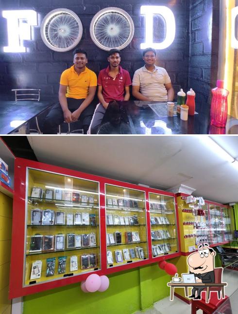 Take a seat at one of the tables at WTF FOOD CORNER