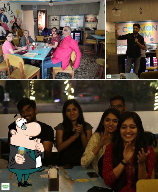 Among different things one can find bar counter and dining table at The Common Room